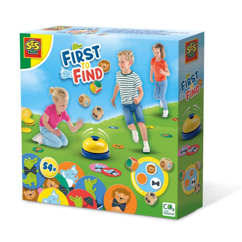 Kinder spielen das First to Find-Spiel von SES mit Tierfiguren und einem gelben Buzzer. Kinder spielen das First to Find-Spiel von SES mit Tierfiguren und einem gelben Buzzer.