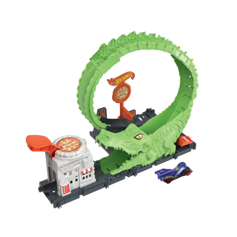 Hot Wheels Set mit grünem Krokodils-Looping, Abschussrampe und blauem Spielauto daneben.