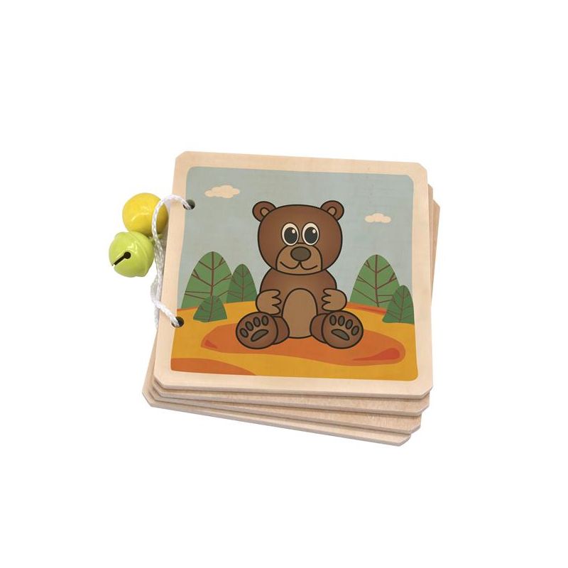 Holzbuch mit Comic-Bär auf dem Umschlag, zwei gelbe Glocken an weißer Schnur befestigt. Holzbuch mit Comic-Bär auf dem Umschlag, zwei gelbe Glocken an weißer Schnur befestigt.