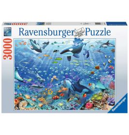 Ravensburger 3000 Teile Puzzle mit buntem Meeresleben: Orcas, Fische und Korallen.