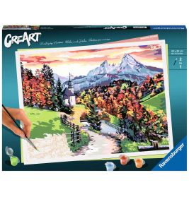 Eine Hand malt per Malen nach Zahlen eine bunte Herbstberglandschaft Farben und Pinsel liegen neben der Leinwand.