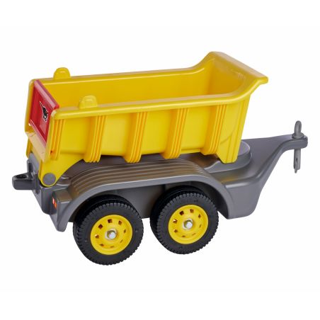 Gelber und grauer Spielzeuganhänger mit vier schwarzen Rädern und einer Kupplung zur Befestigung. Gelber und grauer Spielzeuganhänger mit vier schwarzen Rädern und einer Kupplung zur Befestigung.