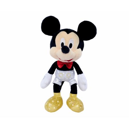 Eine Plüsch-Mickey-Mouse trägt glitzernde goldene Schuhe, weiße Shorts und eine rote Fliege. Eine Plüsch-Mickey-Mouse trägt glitzernde goldene Schuhe, weiße Shorts und eine rote Fliege.