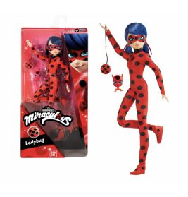 Marienkäfer-Puppe im rot-schwarzen Punktanzug mit roter Maske und blauen Haaren, in und außerhalb der Verpackung.