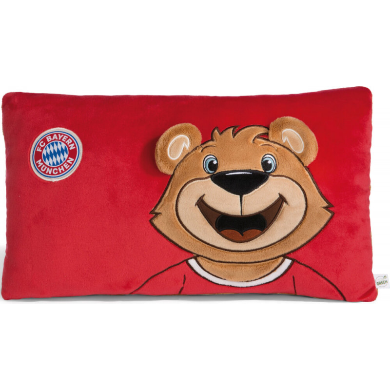 Rotes Kissen mit lächelndem Bären und FC Bayern München Logo oben links.