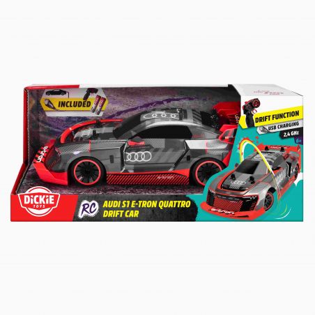 Audi S1 E-Tron Quattro Drift Spielzeugauto in rot-schwarzer Box mit Fernbedienung und USB-Ladekabel abgebildet.