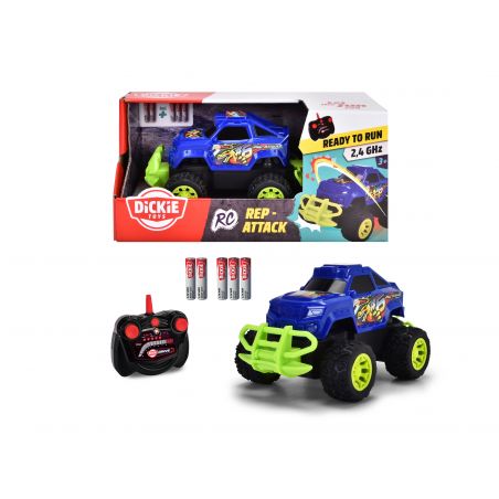 Blaues RC-Monstertruck-Spielzeug mit grünen Rädern, Fernbedienung, Batterien und Verpackung im Hintergrund.