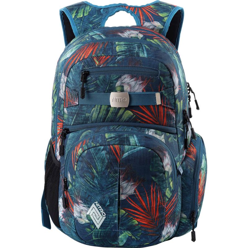Blauer Rucksack mit tropischem Blattmuster, mehreren Reißverschlussfächern und seitlichen Taschen. Blauer Rucksack mit tropischem Blattmuster, mehreren Reißverschlussfächern und seitlichen Taschen.