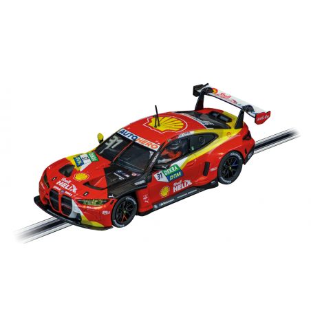 Rotes und gelbes Slotcar mit Shell-Logo und Renndekors auf einer Rennbahn, aus der Vogelperspektive.