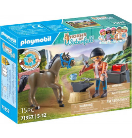 Playmobil-Set Pferde des Wasserfalls: Box mit Pferd, Mädchenfigur und Zubehör. Für Kinder von 5 bis 12 Jahren geeignet.