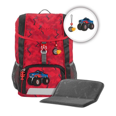 Roter Kinder-Rucksack mit Monstertruck-Motiv, passendem Schlüsselanhänger und herausnehmbarem schwarzem Sitzkissen.
