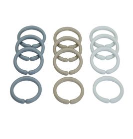 Zwölf Kunststoffringe in Grau, Beige und Weiß liegen farblich sortiert in drei Reihen auf weißem Hintergrund.