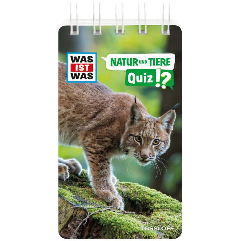 Ein Luchs steht auf einem moosbedeckten Baumstamm - Titelbild eines deutschen Natur- und Tierquiz-Hefts.
