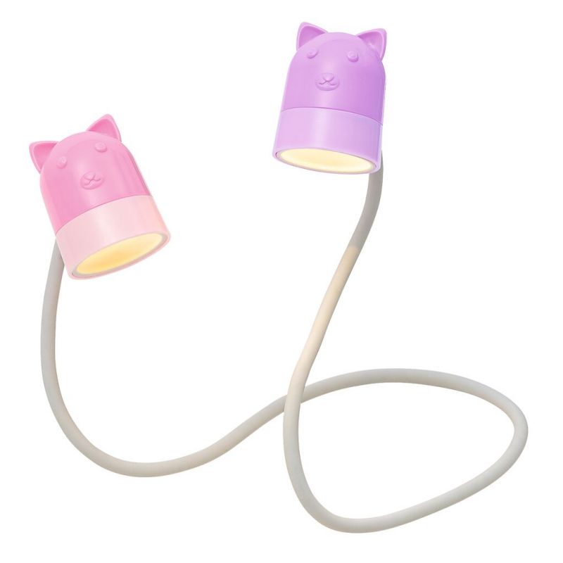 Zwei flexible Schreibtischlampen mit katzenförmigen, pinken und violetten Schirmen auf weißem Sockel.