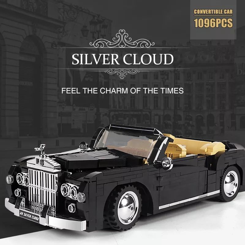 Schwarzes und beiges LEGO-Cabrio Silver Cloud mit 1096 Teilen vor einer Stadtkulisse ausgestellt. Schwarzes und beiges LEGO-Cabrio Silver Cloud mit 1096 Teilen vor einer Stadtkulisse ausgestellt.