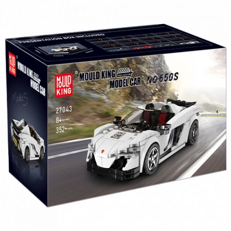 Verpackung des Mould King Modells 27043 mit weißem Sportwagen auf Straße und Bergen im Hintergrund.