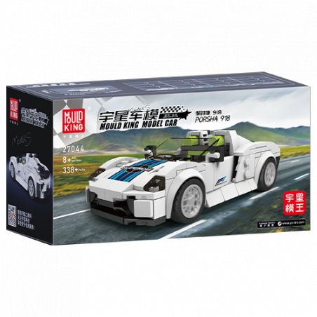 Box eines weißen Sportwagen-Bausatzes von Mould King vor landschaftlichem Hintergrund.