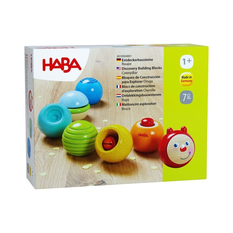 HABA Raupen-Entdeckerbausteine ab 1 Jahr: Bunte, runde Steine und ein lächelndes Gesicht in der Box. HABA Raupen-Entdeckerbausteine ab 1 Jahr: Bunte, runde Steine und ein lächelndes Gesicht in der Box.