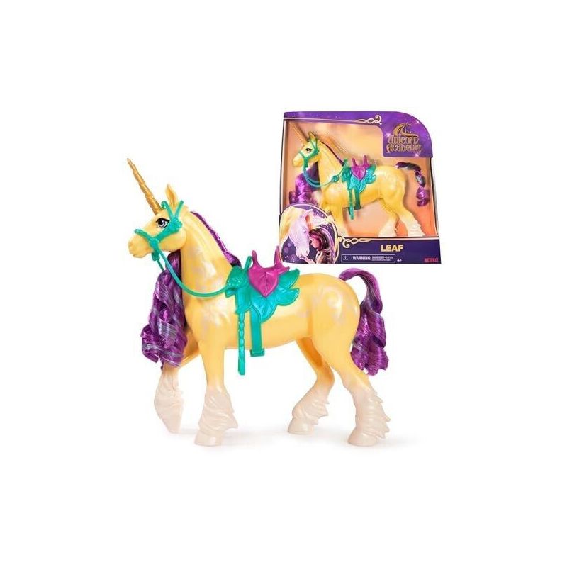 Gelbes Einhorn-Spielzeug mit lila Mähne, grünem Sattel, goldenem Horn, in lila-gelber Verpackung. Gelbes Einhorn-Spielzeug mit lila Mähne, grünem Sattel, goldenem Horn, in lila-gelber Verpackung.