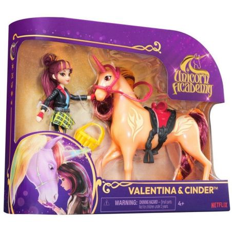 Unicorn Academy Spielset mit Valentina-Puppe, Cinder-Einhorn, Sattel und Zubehör in lila Verpackung.