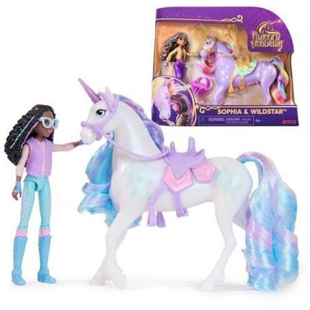 Puppe mit Brille und Einhornspielzeug mit pastellfarbenem Sattel neben Verpackung, die beide Figuren zeigt.