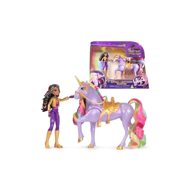 Puppe mit lila Einhorn-Spielzeug, Regenbogenmähne und passender lila-goldener Verpackung im Hintergrund.