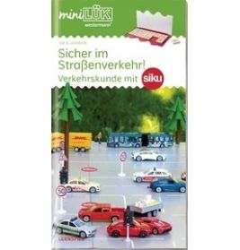 Brettspielschachtel mit Spielzeugautos, Verkehrsschildern und deutschem Text zur Verkehrssicherheit für Kinder.
