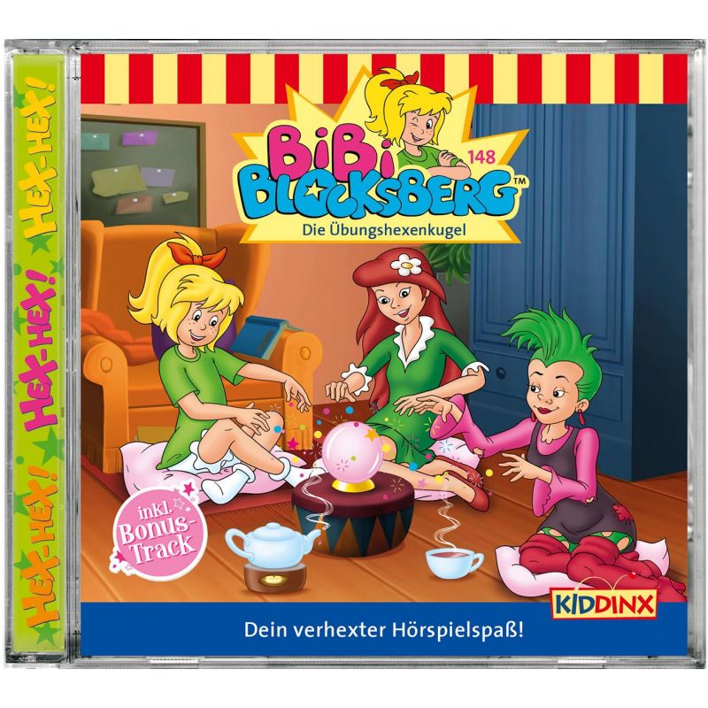 Drei Cartoonhexen spielen mit einer leuchtenden Kugel auf dem Boden eines bunten Wohnzimmers.