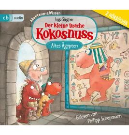 Drei Comic-Drachen betrachten auf dem Cover von Der kleine Drache Kokosnuss Altes Ägypten ägyptische Wandkunst.
