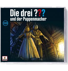 Zwei menschengroße Puppen stehen auf einer Holztreppe im dunklen Dachboden unter dem Titel Die drei ???.