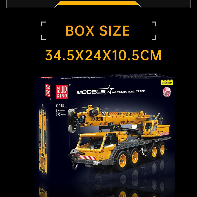 Schachtel mit gelbem Kran-Bausatz, Maße 34,5 x 24 x 10,5 cm.