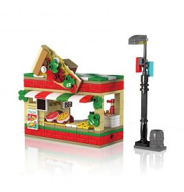 LEGO-Pizzeria mit ausgestellten Pizzen, Riesenscheibe auf dem Dach und Straßenlaterne daneben.