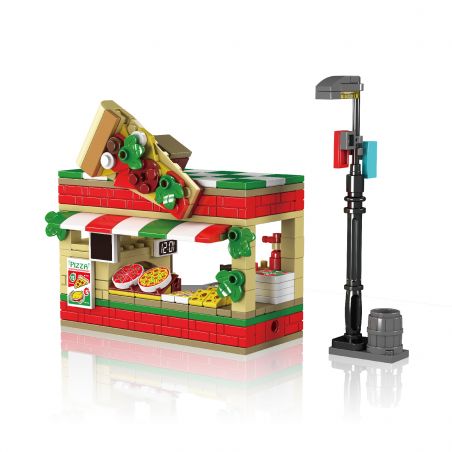 LEGO-Pizzeria mit ausgestellten Pizzen, Riesenscheibe auf dem Dach und Straßenlaterne daneben.