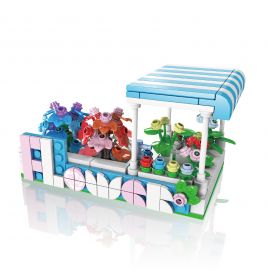 LEGO Blumenstand mit bunten Blumen, blau-weiß gestreiftem Dach und pastellfarbenem "Flower"-Schild.