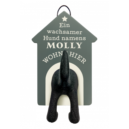 Hundehütte mit 3D-Hundehinterteil und dem Text: Ein wachsender Hund namens Molly wohnt hier.