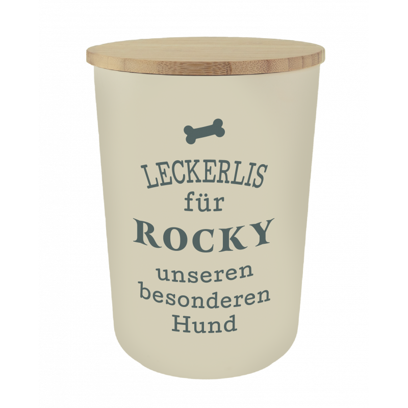 Beige Leckerli-Dose mit Holzdeckel, deutsch beschriftet für einen besonderen Hund namens Rocky. Beige Leckerli-Dose mit Holzdeckel, deutsch beschriftet für einen besonderen Hund namens Rocky.