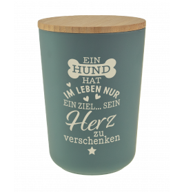 Grüner Behälter mit Holzdeckel und deutschem Text über einen Hund, der sein Herz verschenkt.