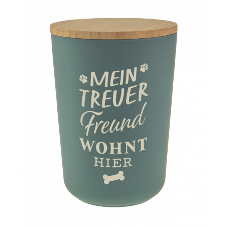 Grüner Behälter mit Holzdeckel, Aufschrift Mein treuer Freund wohnt hier, Pfotenabdrücke und Knochen.