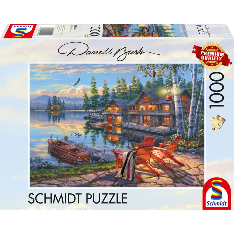 Schmidt Puzzle mit 1000 Teilen: Seehütte, Boote und Adirondack-Stühle bei Sonnenuntergang auf der Verpackung. Schmidt Puzzle mit 1000 Teilen: Seehütte, Boote und Adirondack-Stühle bei Sonnenuntergang auf der Verpackung.