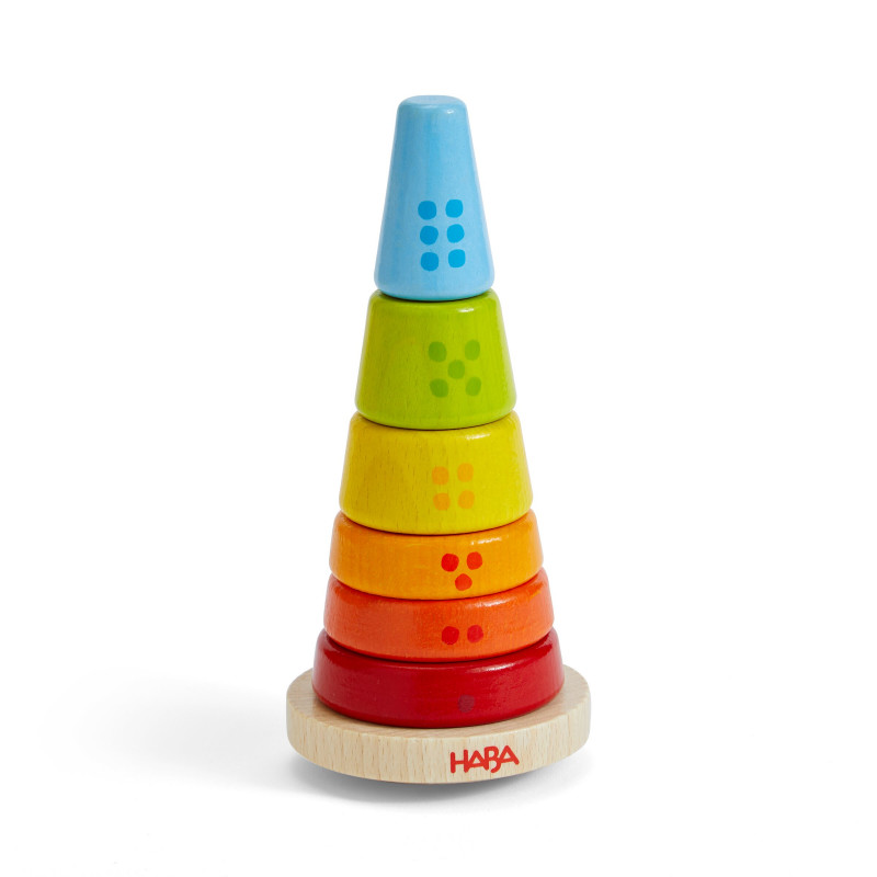 Holz-Steckspielzeug mit bunten Ringen in Rot, Orange, Gelb, Grün und Blau auf rundem Sockel.