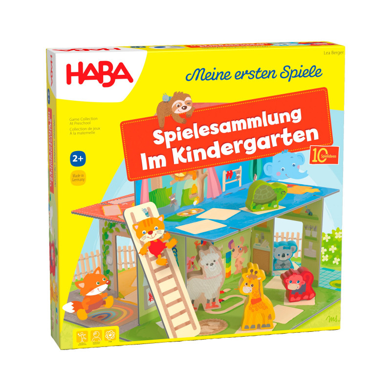 Box der Spielesammlung im Kindergarten von HABA mit Tierfiguren in einem Spielzimmer.
