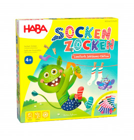 Bunte HABA-Spieleschachtel Socken Zocken mit grünem Monster, das Socken an einer Leine aufhängt.