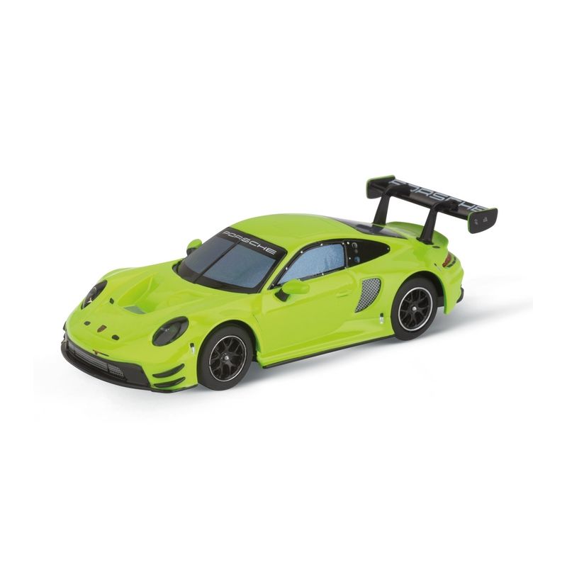 Ein limettengrünes Spielzeug-Sportauto mit großem schwarzen Heckspoiler vor weißem Hintergrund. Ein limettengrünes Spielzeug-Sportauto mit großem schwarzen Heckspoiler vor weißem Hintergrund.