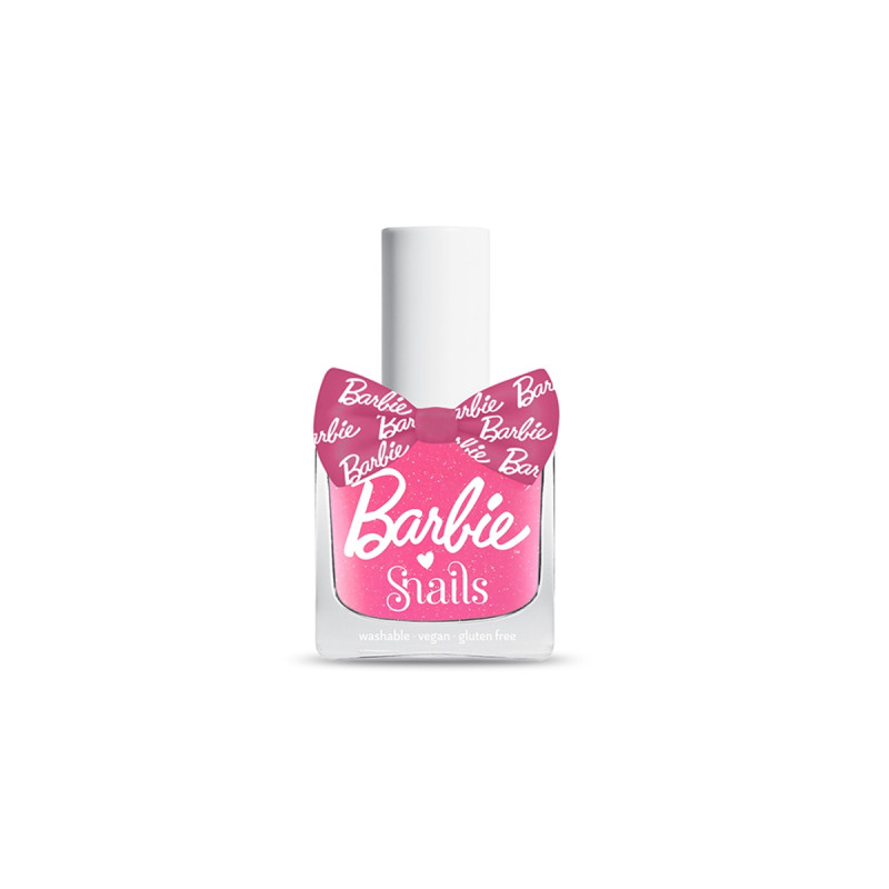 Eine pinke Nagellackflasche im Barbie-Design mit weißer Aufschrift und weißem Deckel.