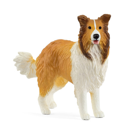 Eine Plastikfigur eines braun-weißen Collies steht mit heraushängender Zunge.