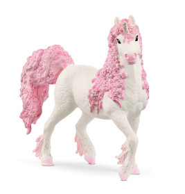 Ein weißes Spielzeug-Einhorn mit langen, lockigen, rosa Haaren, glitzernden Hufen und funkelndem Horn.