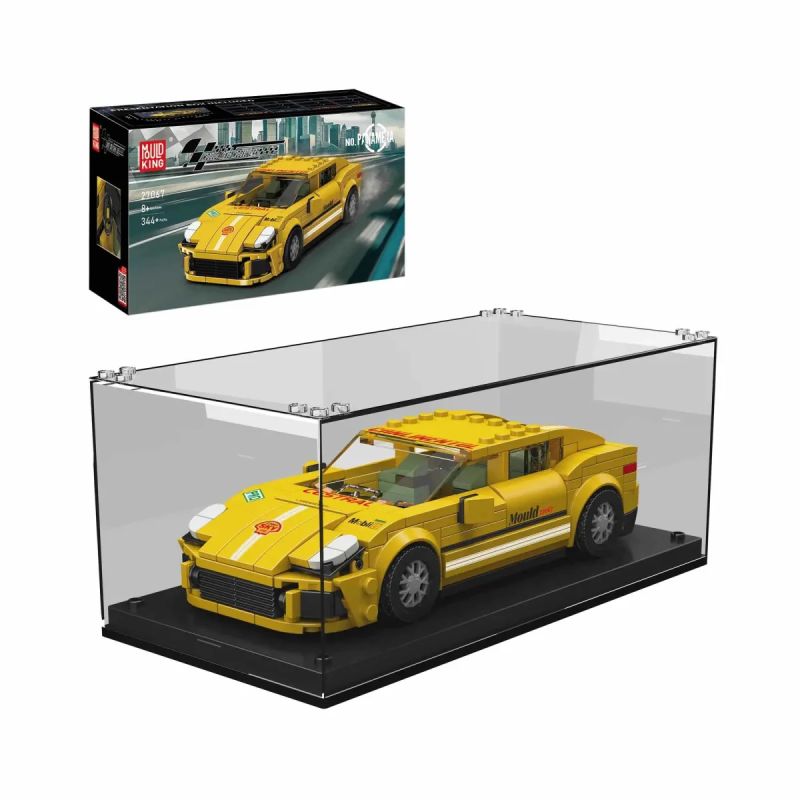 Gelbes Sportwagen-Modell aus Bausteinen in Vitrine, im Hintergrund ist die Verpackung zu sehen. Gelbes Sportwagen-Modell aus Bausteinen in Vitrine, im Hintergrund ist die Verpackung zu sehen.