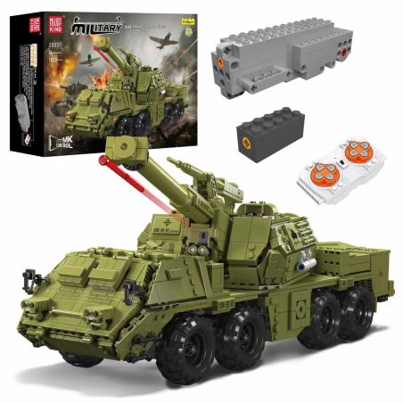 Grünes Militär-Spielzeugfahrzeug als Bausatz mit Fernsteuerung, Motoren und Verpackung im Hintergrund.