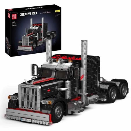 Schwarzes und rotes Spielzeug-Lastwagenmodell mit Verpackung, die den gleichen Truck zeigt.