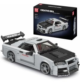 Graues Nissan-LEGO-Modell mit Spoiler neben Verpackung mit Aufschrift Creative Idea und Mould King.